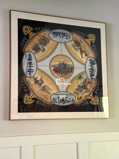 A square Hermes scarf 90 frame branded Arts & Artisan on a white wall