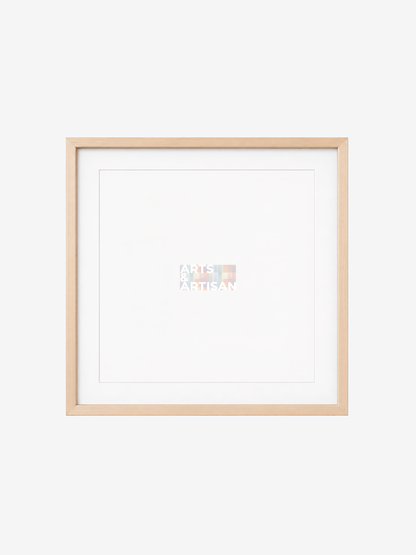 A square light wood picture frame with a wide white mat, shown empty against a very light gray background. A faint small logo appears near the center of the mat.
