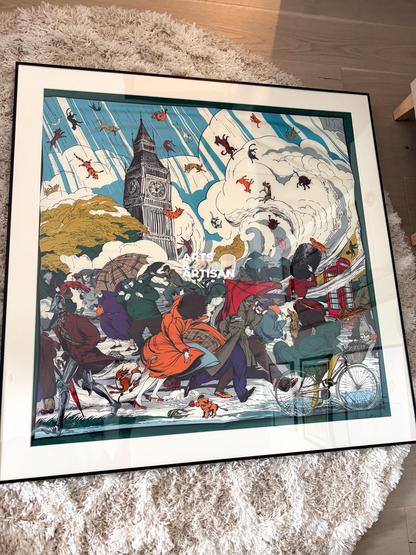 A framed Burberry scarf featuring a whimsical, detailed illustration of London people in winter clothing near Big Ben, displayed on a white shag rug.