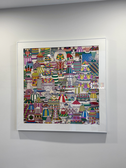 A framed square Hermes Scarf featuring a highly detailed, colorful folk-art style illustration of traditional Indian lamps (oil lamps) in a mandala pattern, mounted on a light gray wall.